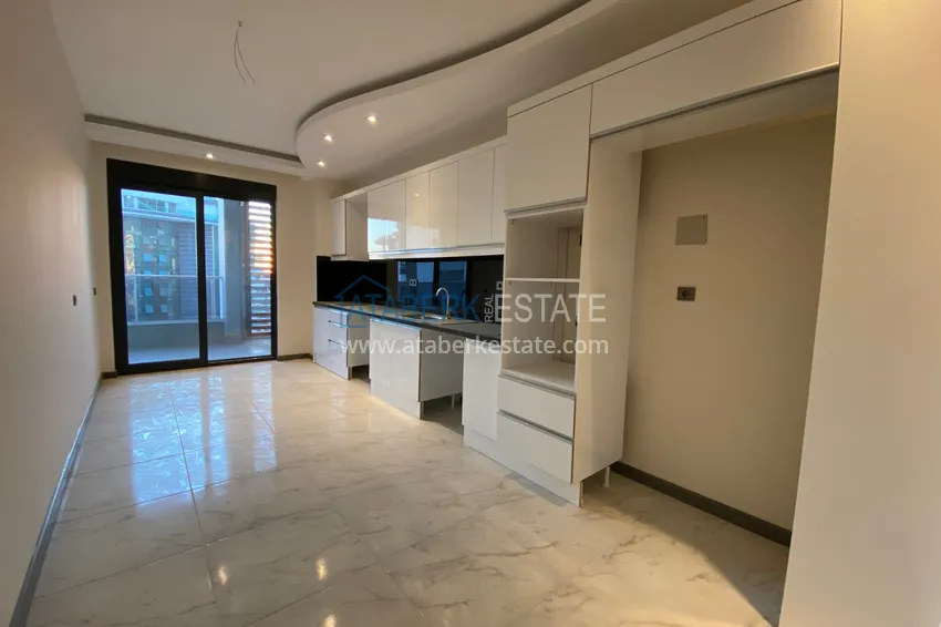 Приобрести Квартира в Махмутларе четырёхкомнатная с отдельной кухней  3 