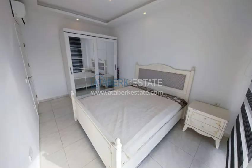 Приобрести Квартира в Махмутларе меблированная двухкомнатная с открытым видом 4 