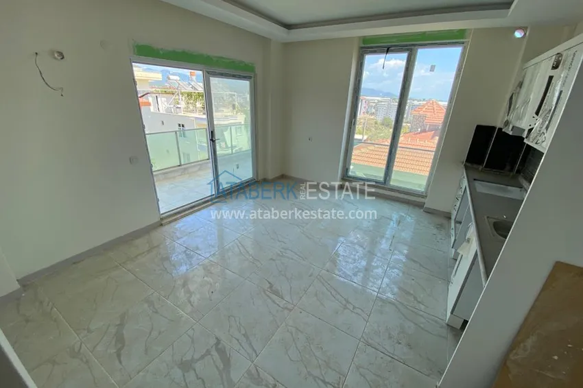 Приобрести Квартира в районе Авсаллар с чистовой отделкой и видом на горы 5 