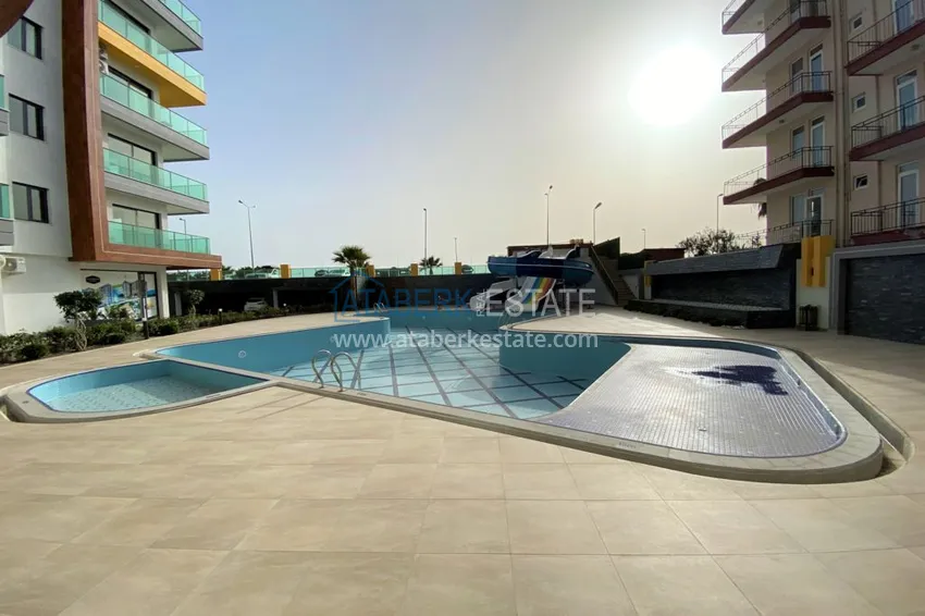 Квартира в Махмутларе с чистовой отделкой в новом комплексе, на первой береговой 5 