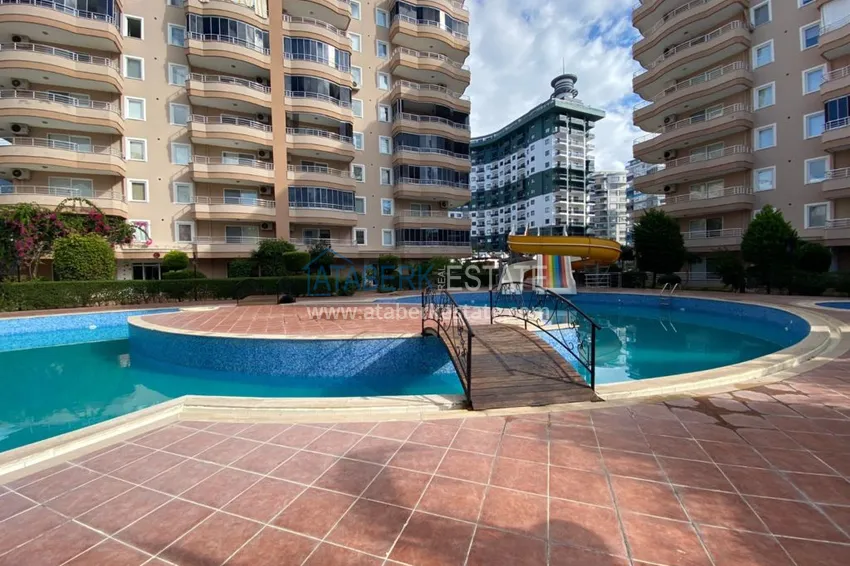 Квартира с мебелью в благоустроенном жилом комплексе в Махмутларе 6 