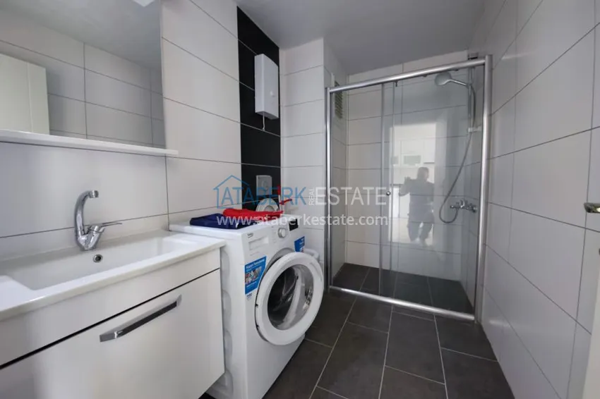 Приобрести Квартира в Махмутларе меблированная двухкомнатная с открытым видом 6 