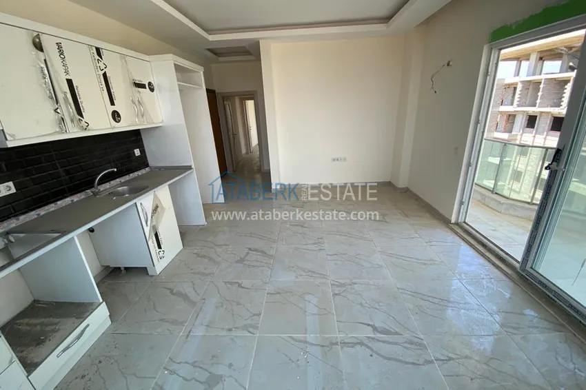 Приобрести Квартира в районе Авсаллар с чистовой отделкой и видом на горы 7 