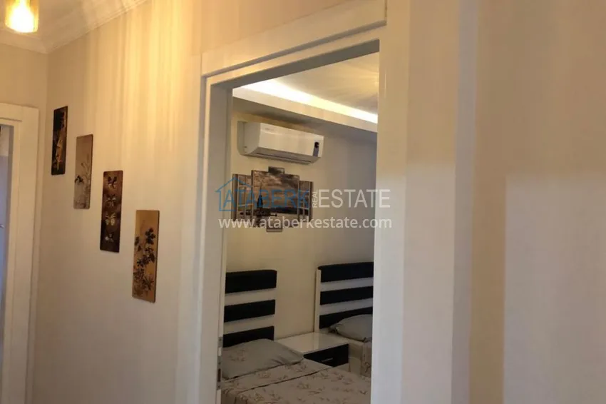 Приобрести Квартира в Махмутларе с террасой у самого моря  8 