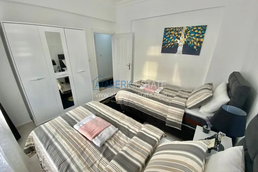 Приобрести Квартира в Махмутларе, трехкомнатная с мебелью, отдельной кухней и видом на море 9 