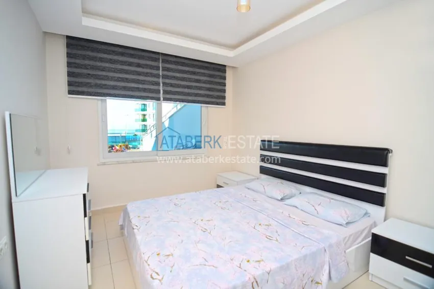 Приобрести Квартира в Махмутларе с террасой у самого моря  10 