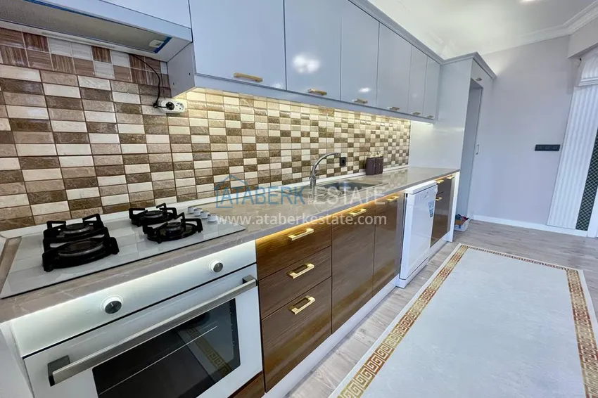 Приобрести Квартира в Махмутларе с новой мебелью, в комфортабельном комплексе 12 