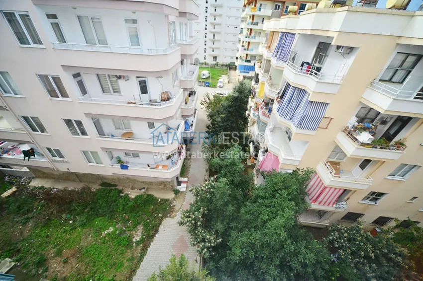 Приобрести Квартира в Махмутларе трехкомнатная с отдельной кухней, рядом с морем 9 