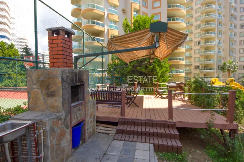 Квартира в Махмутларе с мебелью, застекленным балконом и видом на море  11 