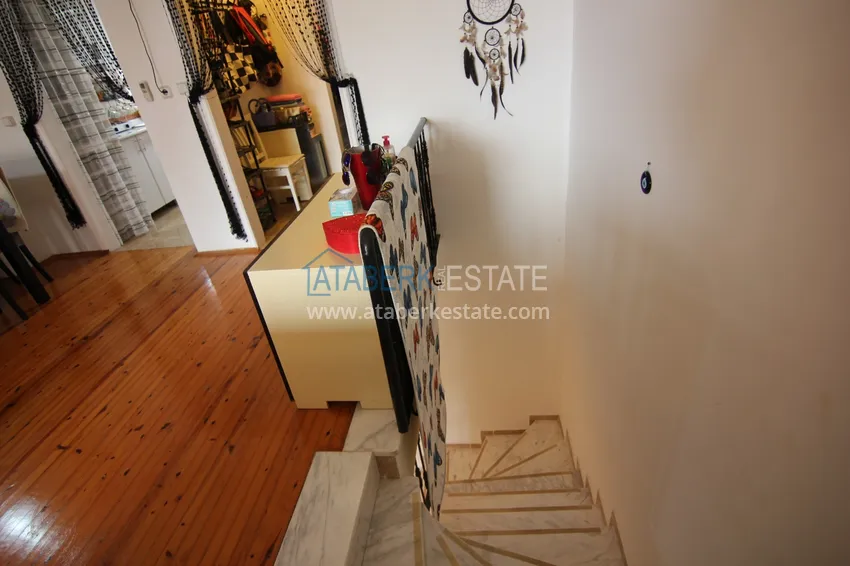 Приобрести Двухуровневая квартира в Махмутларе с мебелью и отдельной кухней 11 