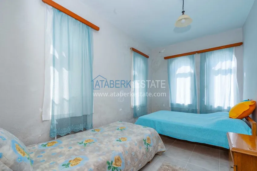 Приобрести Двухэтажная квартира в районе Окурджалар в комплексе закрытого типа 9 