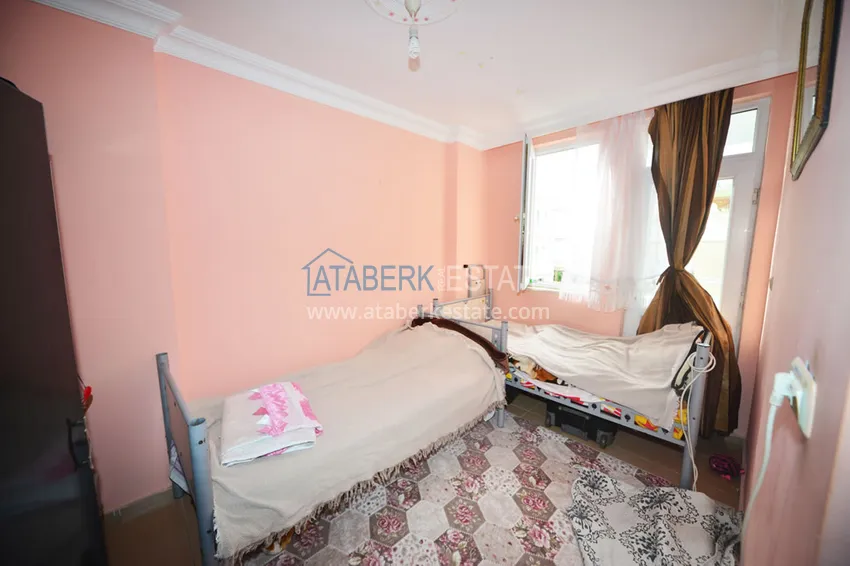 Приобрести Квартира в Махмутларе трехкомнатная с отдельной кухней, рядом с морем 10 