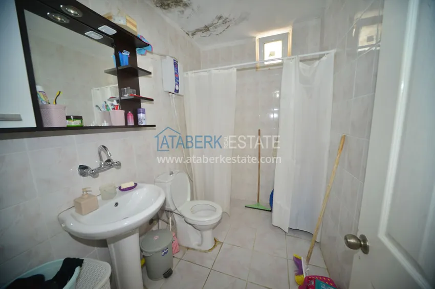 Приобрести Квартира в Махмутларе трехкомнатная с отдельной кухней, рядом с морем 11 