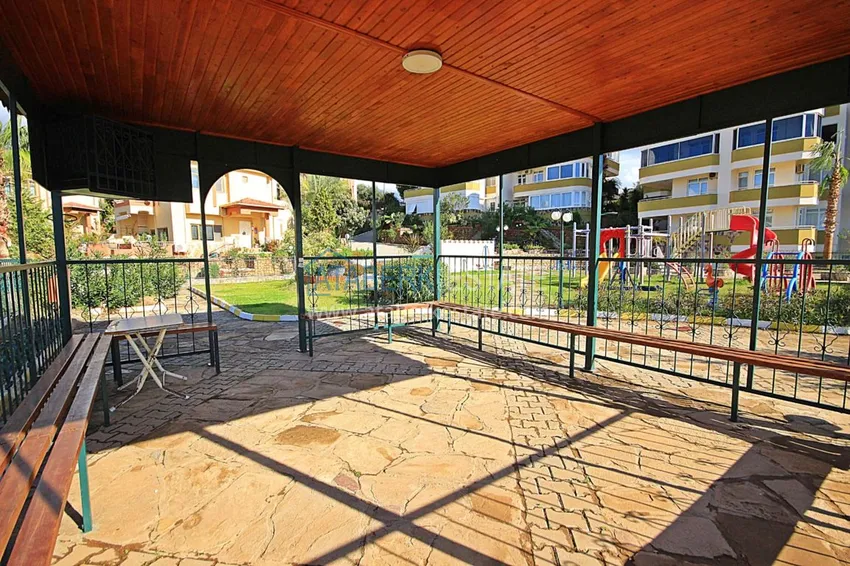 Двухуровневая квартира в Махмутларе с мебелью и отдельной кухней 12 