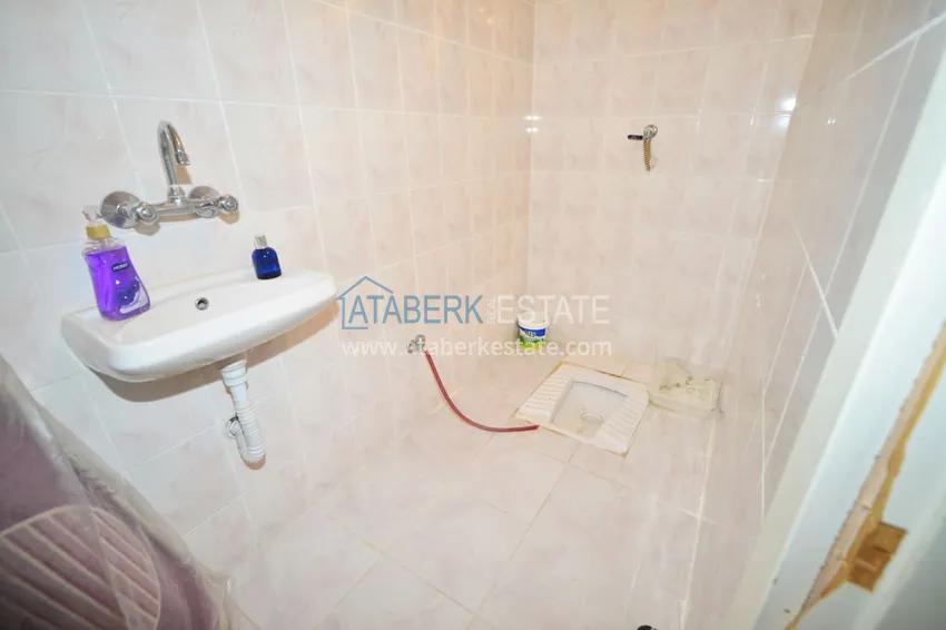 Приобрести Квартира в Махмутларе трехкомнатная с отдельной кухней, рядом с морем 12 