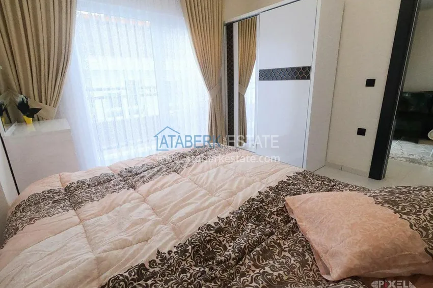 Приобрести Квартира в Махмутларе с мебелью, в новом комплексе 11 