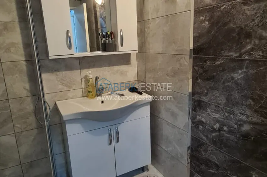 Приобрести Квартира в Махмутларе двухкомнатная с мебелью в жилом доме  13 