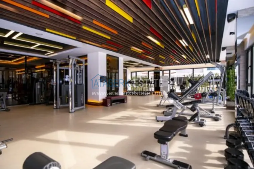 Видовой двухуровневый пентхаус с авторским интерьером в районе Махмутлар 15 