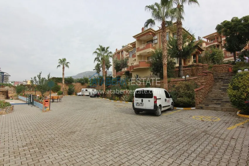 Двухуровневая квартира в Махмутларе с мебелью и отдельной кухней 13 