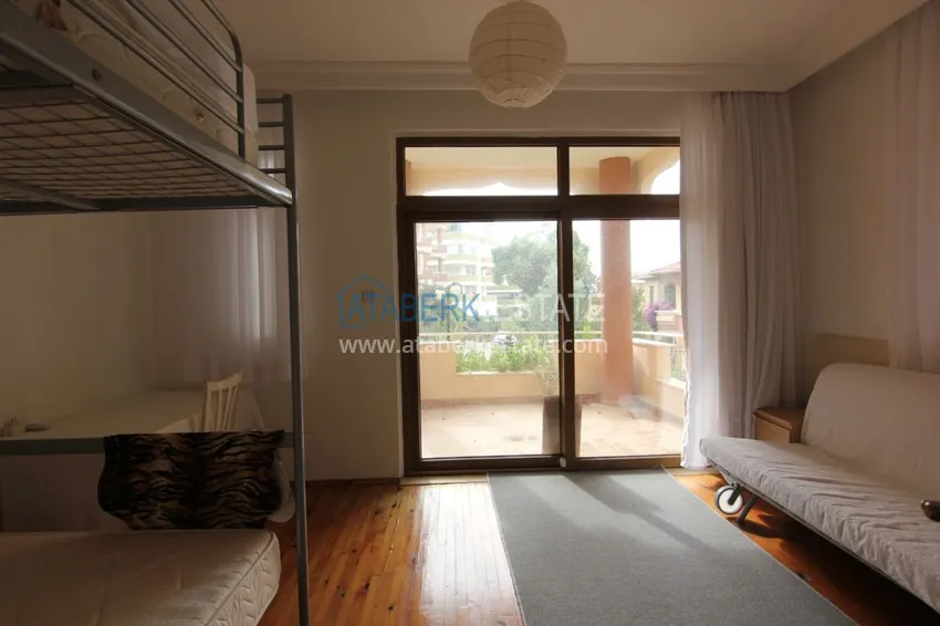 Приобрести Двухуровневая квартира в Махмутларе с мебелью и отдельной кухней 14 