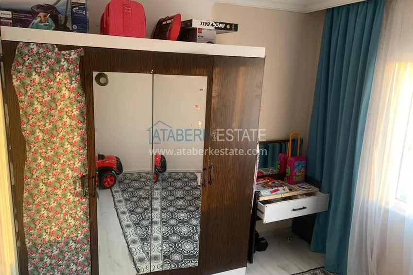 Приобрести Квартира в Махмутларе с мебелью, застекленным балконом и видом на море  16 