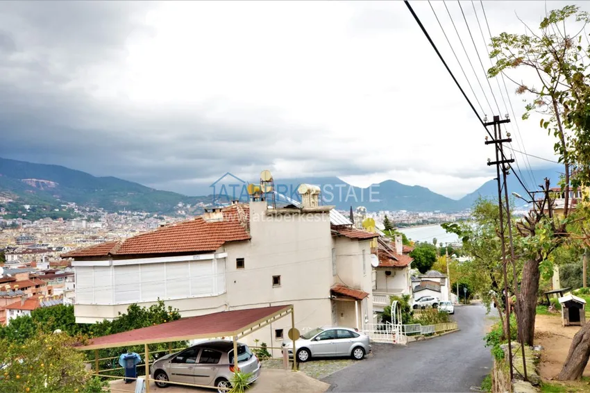 Приобрести Таунхаус в центре Алании с мебелью и роскошными видовыми характеристиками  15 