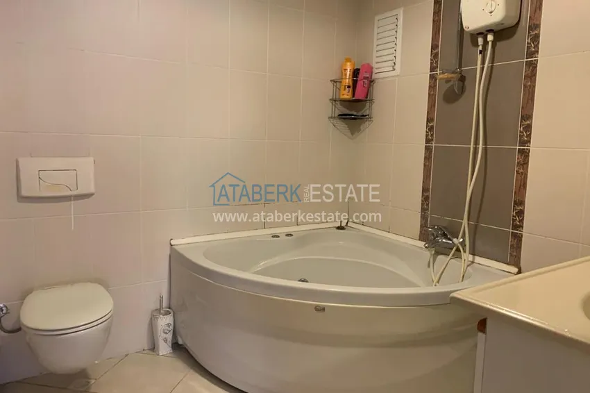 Приобрести Квартира в Махмутларе с мебелью, застекленным балконом и видом на море  17 