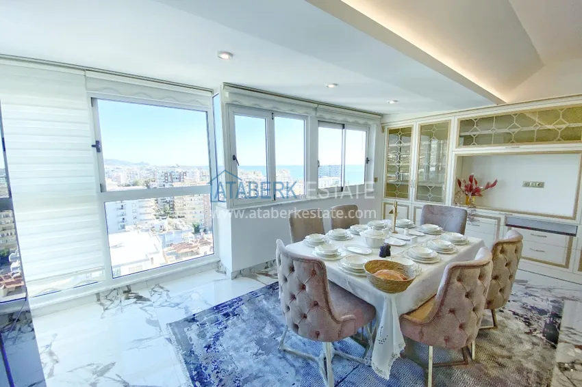 Приобрести Видовой двухуровневый пентхаус с авторским интерьером в районе Махмутлар 16 