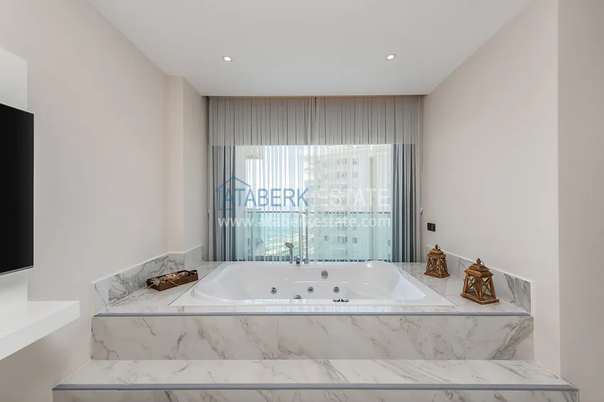 Приобрести Роскошная люксовая квартира в Махмутларе с мебелью и открытым видом на море 19 