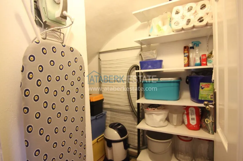 Приобрести Двухуровневая квартира в Махмутларе с мебелью и отдельной кухней 18 