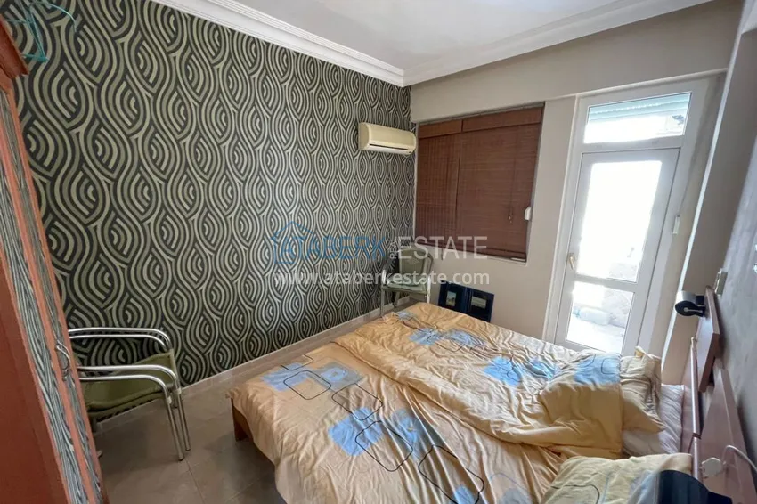 Приобрести Трехкомнатная квартира с мебелью на второй береговой линии в Махмутларе, Алания, 100 м2 23 