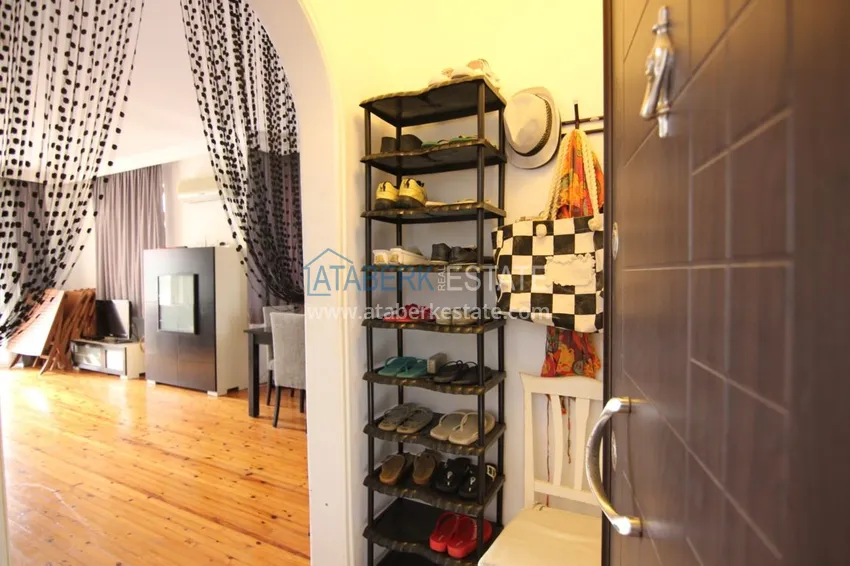 Приобрести Двухуровневая квартира в Махмутларе с мебелью и отдельной кухней 1 