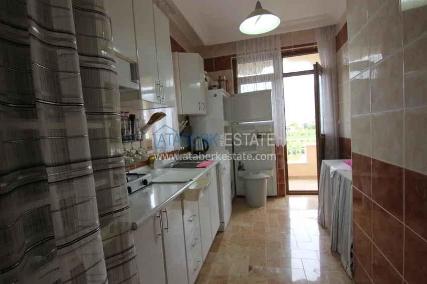 Приобрести Двухуровневая квартира в Махмутларе с мебелью и отдельной кухней 2 