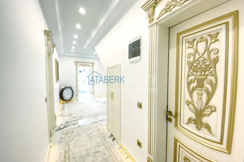 Приобрести Видовой двухуровневый пентхаус с авторским интерьером в районе Махмутлар 20 