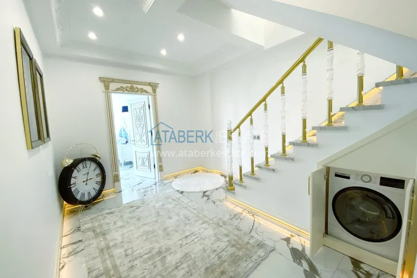 Приобрести Видовой двухуровневый пентхаус с авторским интерьером в районе Махмутлар 22 