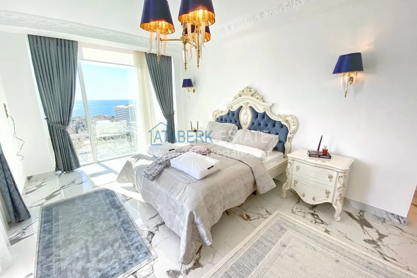 Приобрести Видовой двухуровневый пентхаус с авторским интерьером в районе Махмутлар 24 