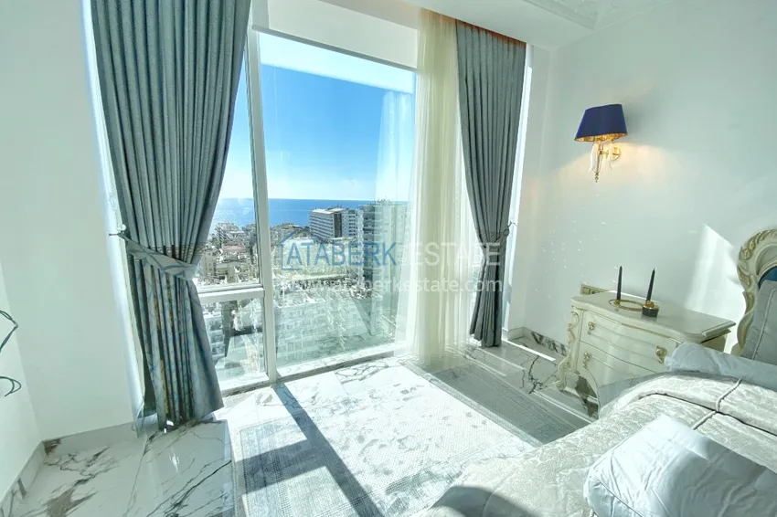 Приобрести Видовой двухуровневый пентхаус с авторским интерьером в районе Махмутлар 26 