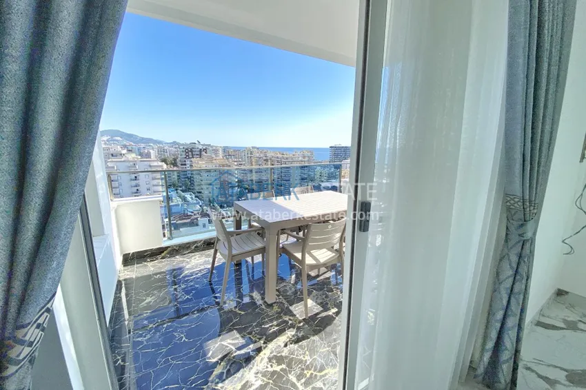 Приобрести Видовой двухуровневый пентхаус с авторским интерьером в районе Махмутлар 30 