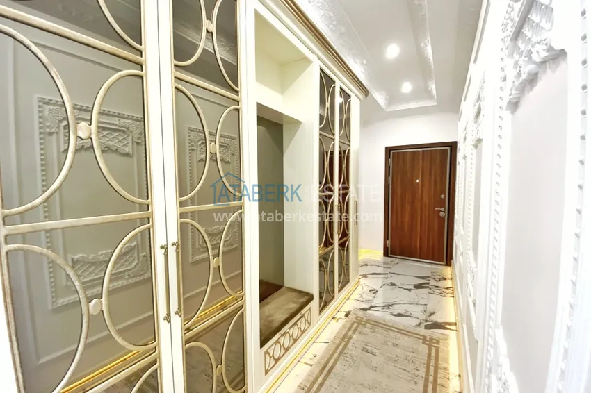 Приобрести Видовой двухуровневый пентхаус с авторским интерьером в районе Махмутлар 2 