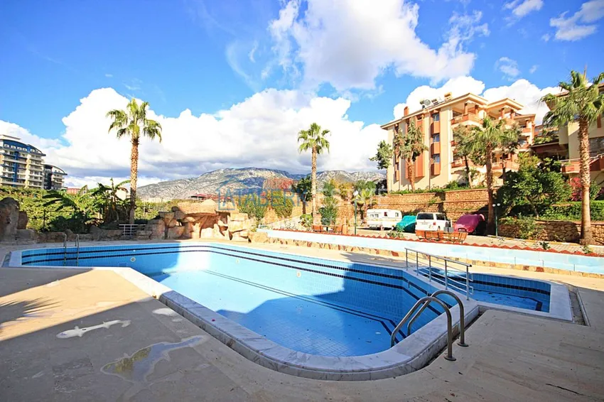 Двухуровневая квартира в Махмутларе с мебелью и отдельной кухней 1 