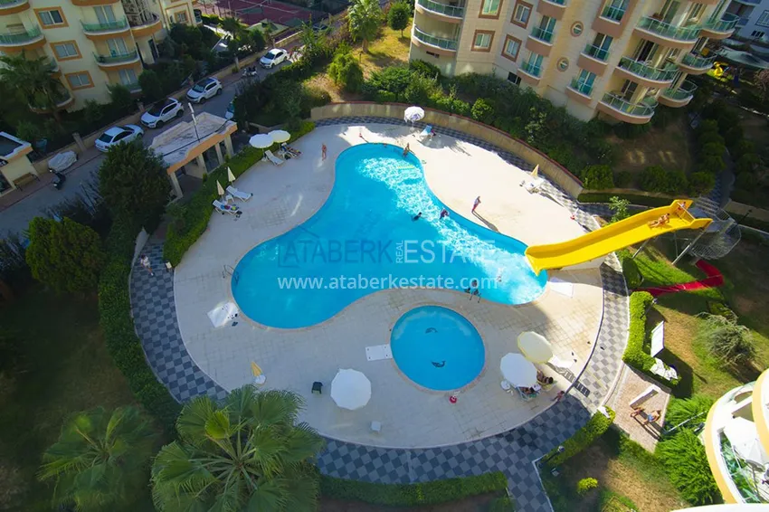 Квартира в Махмутларе с мебелью, застекленным балконом и видом на море  4 