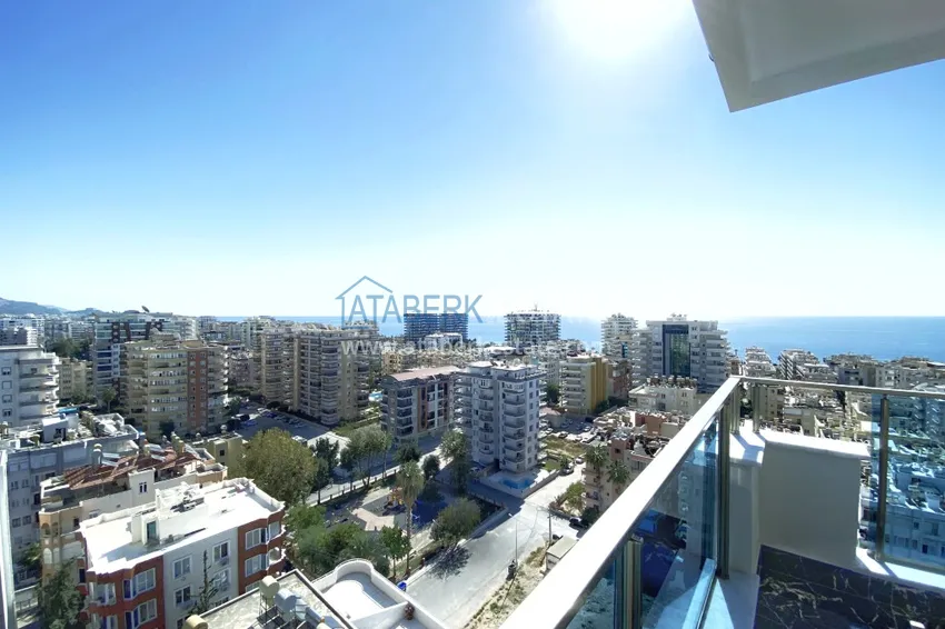 Приобрести Видовой двухуровневый пентхаус с авторским интерьером в районе Махмутлар 32 