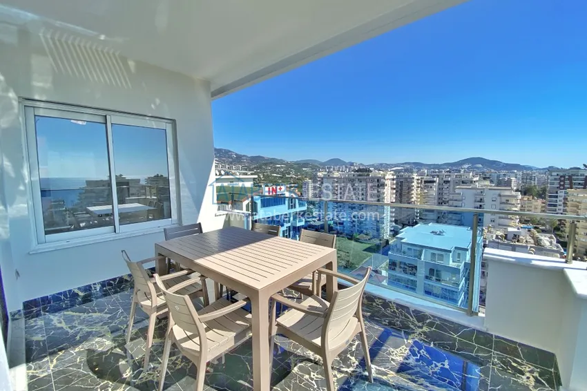 Приобрести Видовой двухуровневый пентхаус с авторским интерьером в районе Махмутлар 33 