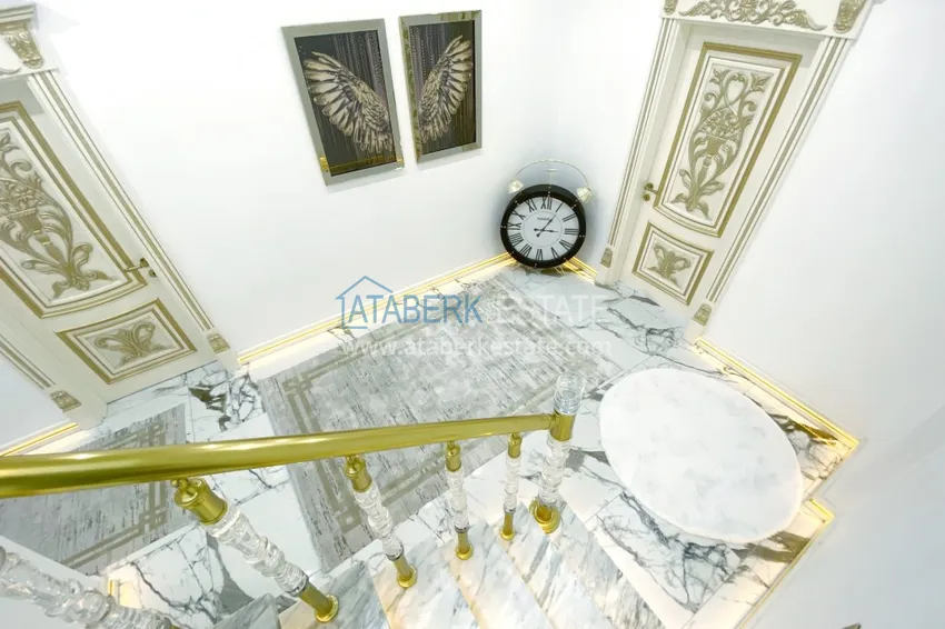 Приобрести Видовой двухуровневый пентхаус с авторским интерьером в районе Махмутлар 42 