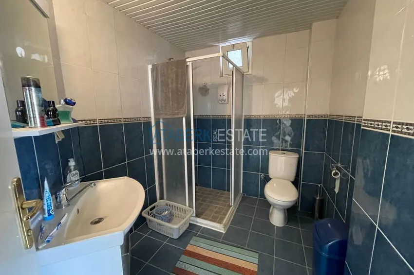 Приобрести Трехкомнатная квартира с мебелью на второй береговой линии в Махмутларе, Алания, 100 м2 4 