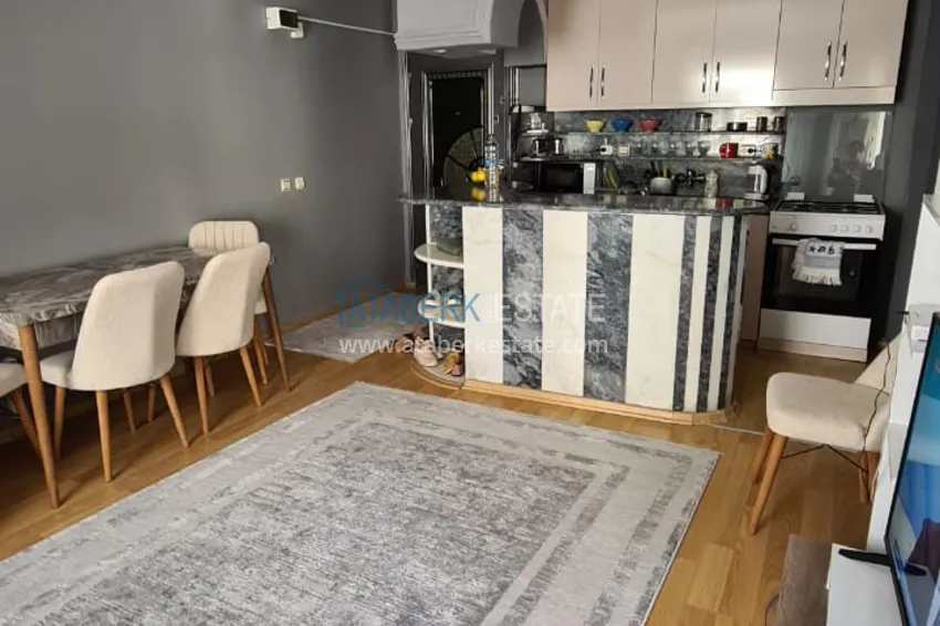 Приобрести Квартира в Махмутларе двухкомнатная с мебелью в жилом доме  4 