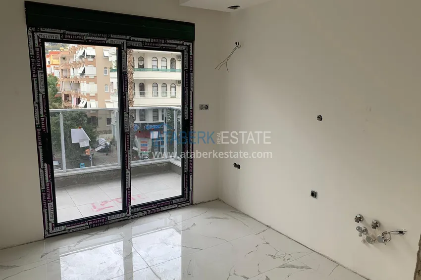 Приобрести Квартира в центре Алании с чистовой отделкой и отдельной кухней - новостройка  4 