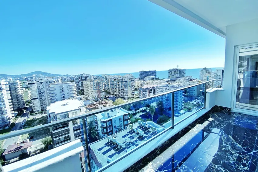 Приобрести Видовой двухуровневый пентхаус с авторским интерьером в районе Махмутлар 61 