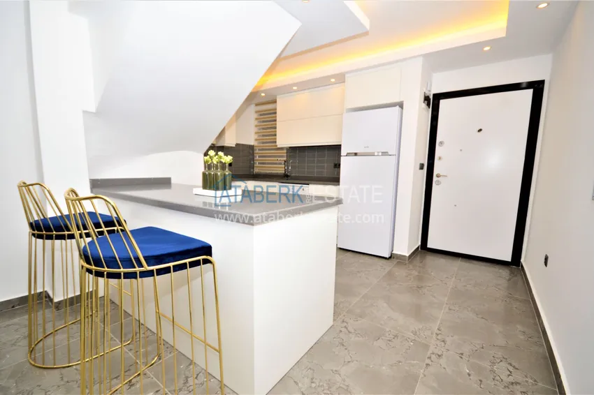 Приобрести Таунхаус в центре Алании с мебелью и роскошными видовыми характеристиками  5 