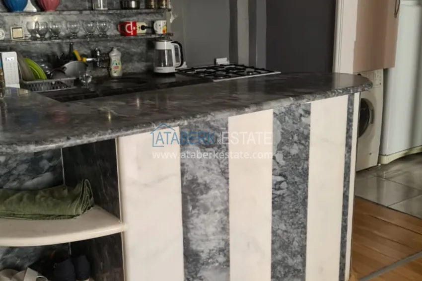 Приобрести Квартира в Махмутларе двухкомнатная с мебелью в жилом доме  5 